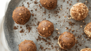 A blend of ground ginger, cinnamon, and nutmeg deepens the cookie flavor and gives the truffles their winter warmth. You can adjust the amounts slightly depending on how bold you like your spice.