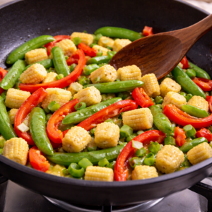 Vegetables come next. A short sauté is enough. This is not about caramelization or depth — it’s about softening.