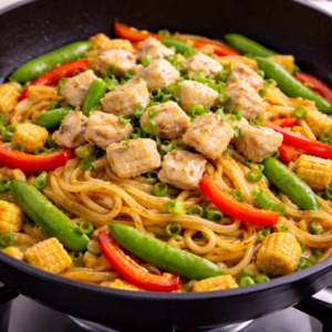 When the noodles relax and absorb the sauce, the dish is ready. Return the protein, add green onions, and stop cooking earlier than instinct suggests. Overcooking creates heaviness.